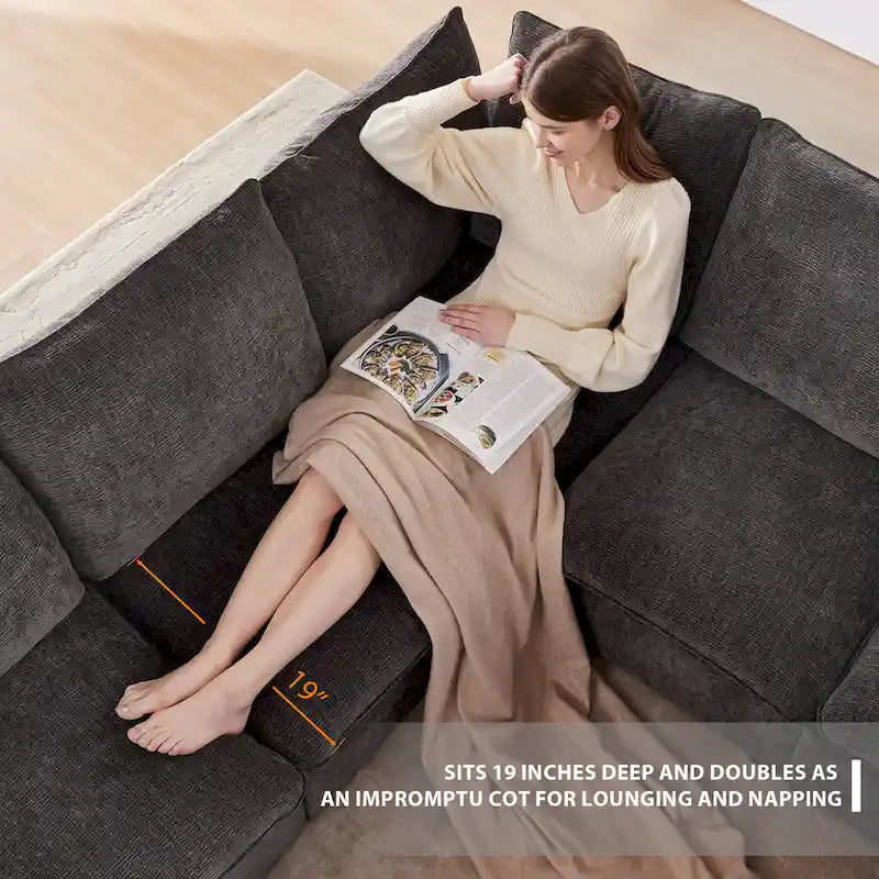 Canapé d'angle modulaire 5 places en chenille noire 84 avec 2 coussins, idéal pour le salon ou l'appartement.