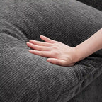 Canapé d'angle modulaire 5 places en chenille noire 84 avec 2 coussins, idéal pour le salon ou l'appartement.