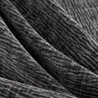 Canapé d'angle modulaire 5 places en chenille noire 84 avec 2 coussins, idéal pour le salon ou l'appartement.