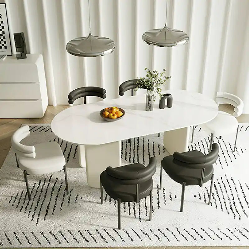 Table de salle à manger ovale moderne en faux marbre crème avec un piètement original à 3 pieds